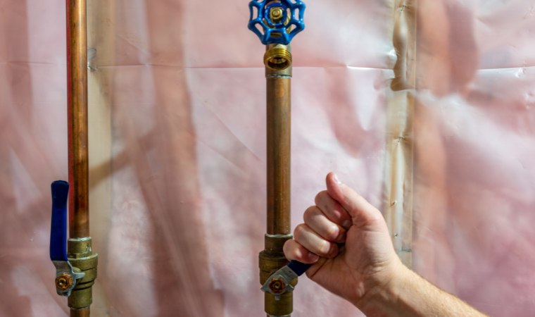 plumber checking sink's pipe before starting a mississauga sewer backup cleaning and repair service plumber checking sink's pipe before starting a mississauga sewer backup cleaning and repair service