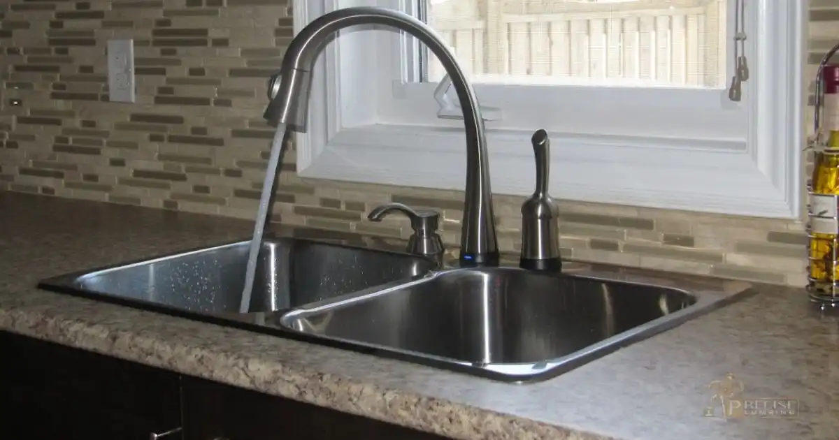 Kitchen and bathroom clogged drain repair with water bursting in pipe