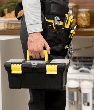 Plumber near me + plumber carrying toolbox, reliable plumbers in Burlington on site